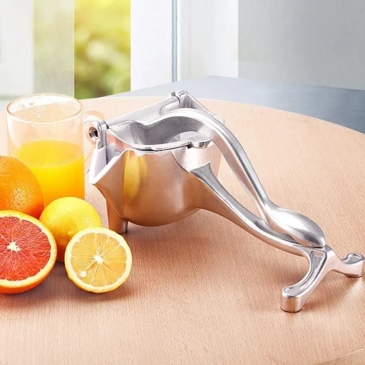 Manual Juicer, Fruit Press Juicer Made Of Heavy Duty Aluminum Alloy - Nest and Nuzzle